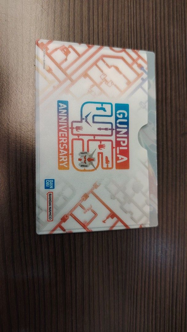 Gunpla 45th Anniversary Card Holder (Category: Toys & Collectibles) located in Singapore. Submitted by novakthegoat (Listing ID 1399990297, Image 2). Description: Gunpla 40th Anniversary Card holder -cna put yoru ez link or any card.