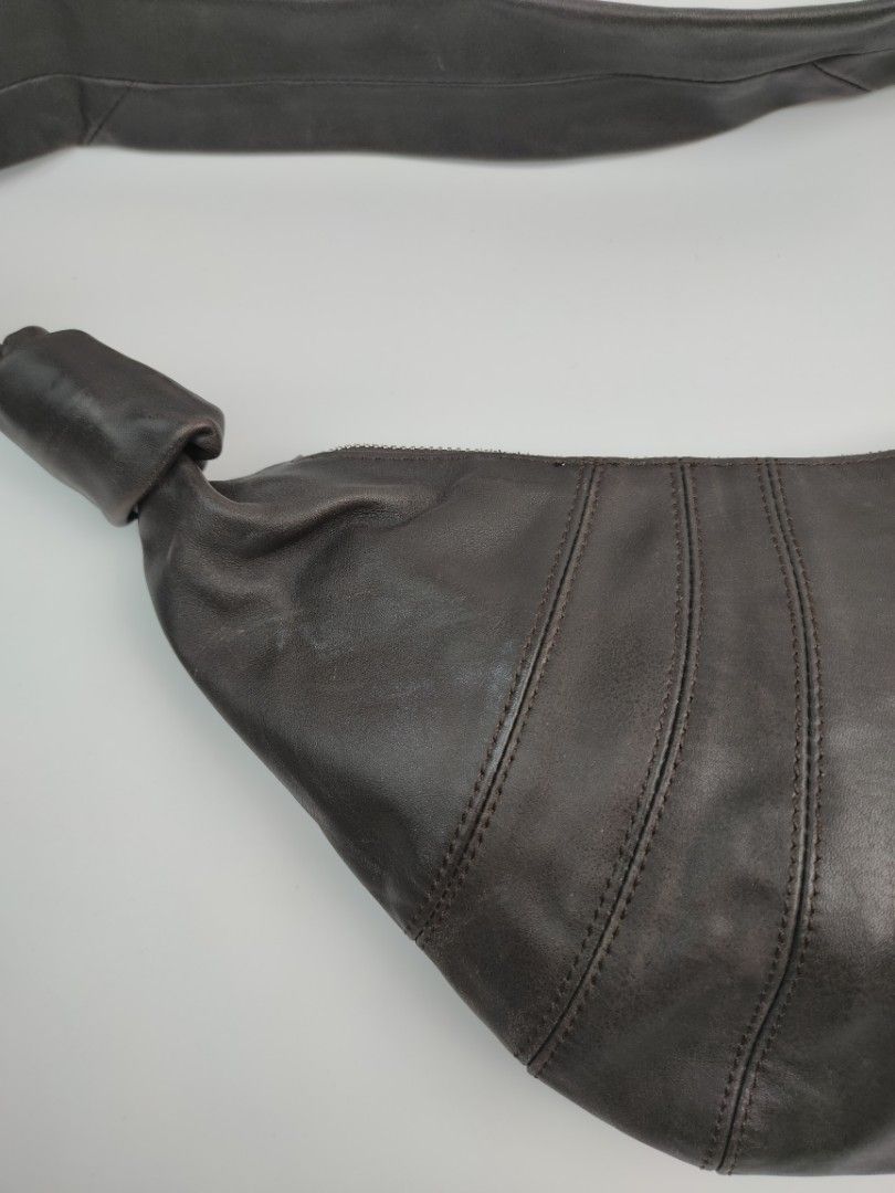 Lemaire Crossaint Crossbody Bag (Category: Belt bags, Clutches and Pouches) located in Muntinlupa City. Submitted by d_code (Listing ID 1399967581, Image 3). Description: Excellent condition UNISEX sign of usage not sure if authentic complete tags magandang klase ng leather.