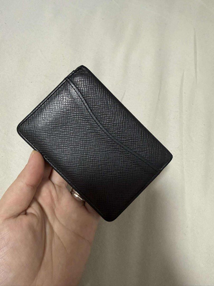 Louis Vuitton Card Holder (Category: Luxury Bags & Wallets) located in Quezon City. Submitted by enythingunderthesun (Listing ID 1399900188, Image 2). Description: - Authentic Louis Vuitton card holder - Color: Black - Interior: Card slots, Louis Vuitton logo - Exterior: Textured finish - Made in France - Condition: Good JAPAN BOUGHT.