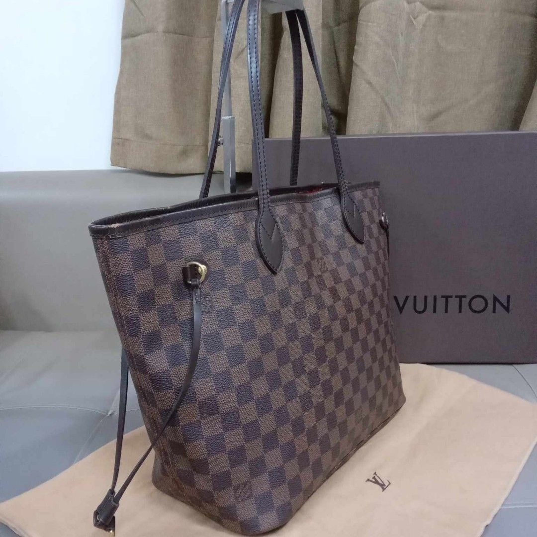 Louis Vuitton Damier Ebene MM (Category: Luxury Bags & Wallets) located in Taguig. Submitted by esa.agustin (Listing ID 1399878888, Image 2). Description: Original Louis Vuitton Neverfull Damier Ebene MM tote bag. With dust bag and box. Made in France..
