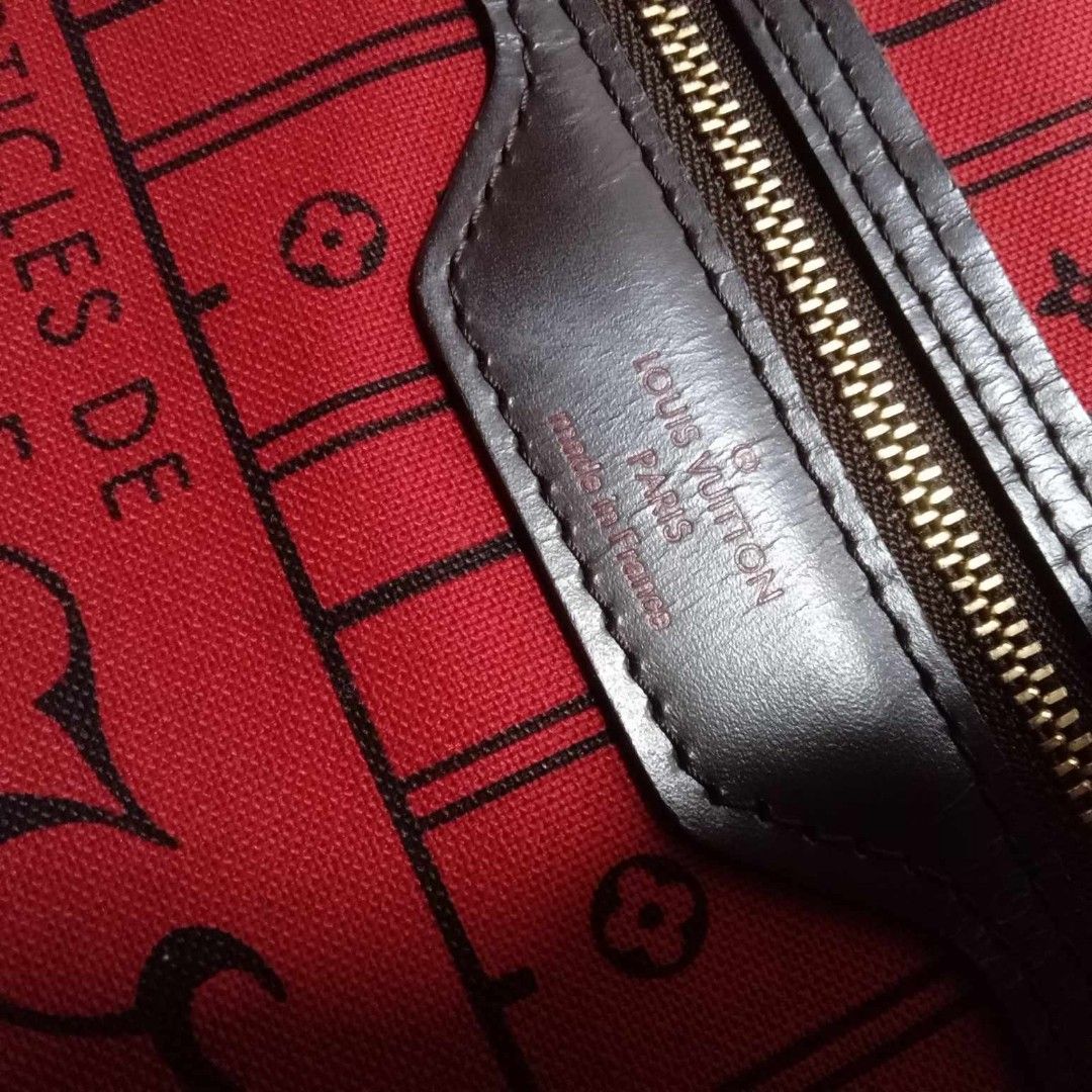 Louis Vuitton Damier Ebene MM (Category: Luxury Bags & Wallets) located in Taguig. Submitted by esa.agustin (Listing ID 1399878888, Image 3). Description: Original Louis Vuitton Neverfull Damier Ebene MM tote bag. With dust bag and box. Made in France..