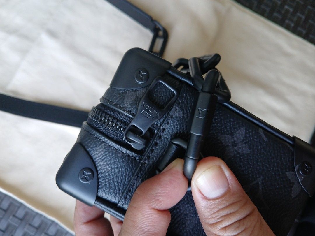 Louis Vuitton Soft Trunk Messenger Bag (Category: Luxury Bags & Wallets) located in Makati City. Submitted by ruschenmor25535 (Listing ID 1399834984, Image 3). Description: - Louis Vuitton Soft Trunk Messenger Bag - Black monogram design - Black chain detail - Adjustable leather strap - Secure zipper closure - Soft fabric interior - Includes original dust bag - Made in France.
