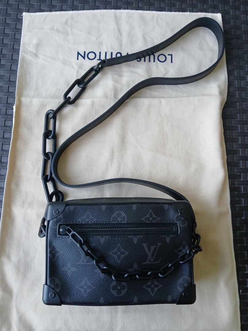 Louis Vuitton Soft Trunk Messenger Bag (Category: Luxury Bags & Wallets) located in Makati City. Submitted by ruschenmor25535 (Listing ID 1399834984, Image 1). Description: - Louis Vuitton Soft Trunk Messenger Bag - Black monogram design - Black chain detail - Adjustable leather strap - Secure zipper closure - Soft fabric interior - Includes original dust bag - Made in France.