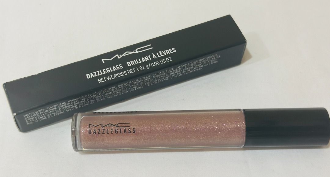 MAC COSMETICS DAZZLEGLASS LIP GLOSS LIPGLOSS - ROLLERGIRL (Category: Makeup) located in San Juan City. Submitted by thesouthbeachedit (Listing ID 1399887442, Image 3). Description: 100 % Authentic from the US! 100% Brand New and Unused MAC COSMETICS DAZZLEGLASS LIP GLOSS LIPGLOSS - ROLLERGIRL nude with pink pearl. It's a light, beige-brown with lighter gold and pink sparkle. .