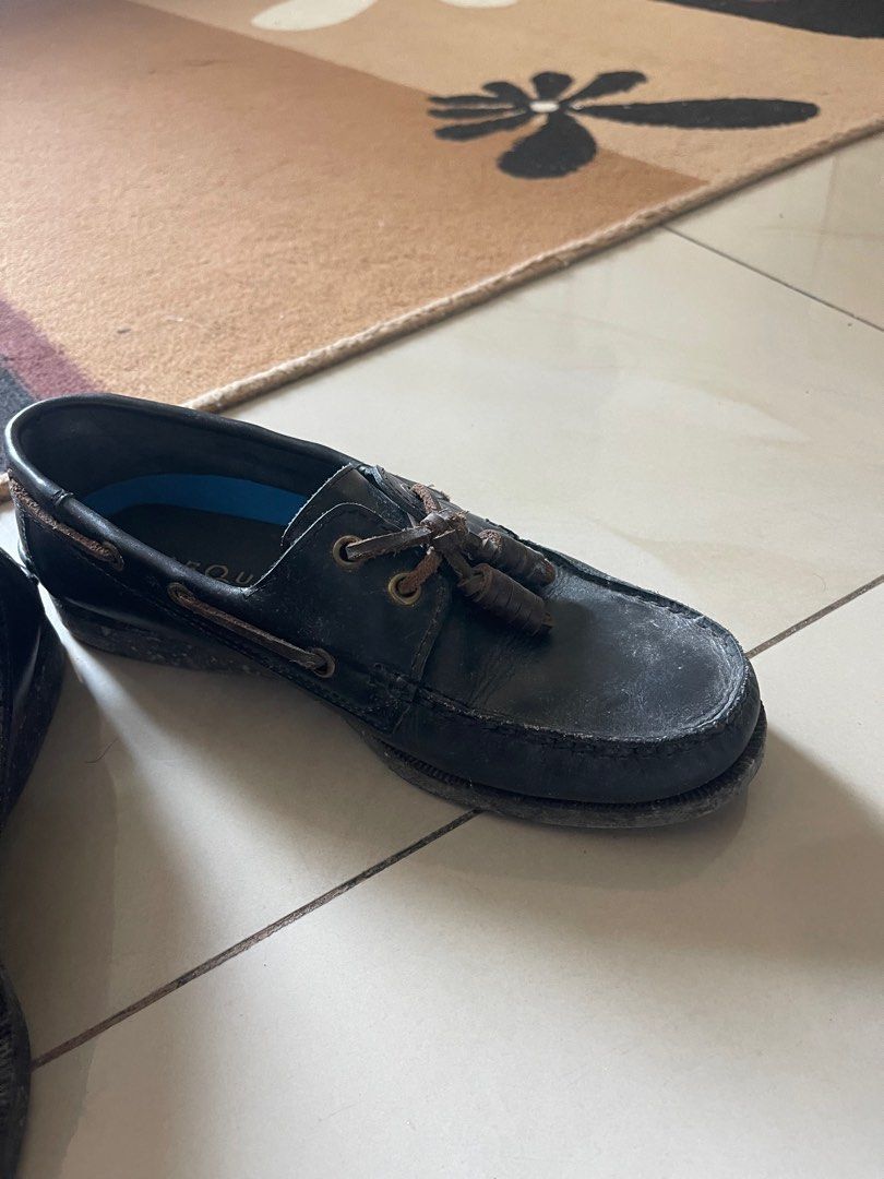 Marco Boat Shoes - Black (Category: Casual Shoes) located in Makati City. Submitted by renzzee (Listing ID 1399901582, Image 2). Description: Classic black boat shoes. Features leather upper with a lace-up design and decorative tassels. The shoes have a stitched sole and a blue insole. Perfect for casual wear..