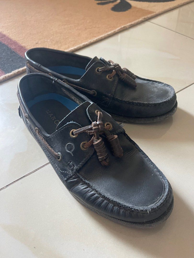 Marco Boat Shoes - Black (Category: Casual Shoes) located in Makati City. Submitted by renzzee (Listing ID 1399901582, Image 3). Description: Classic black boat shoes. Features leather upper with a lace-up design and decorative tassels. The shoes have a stitched sole and a blue insole. Perfect for casual wear..