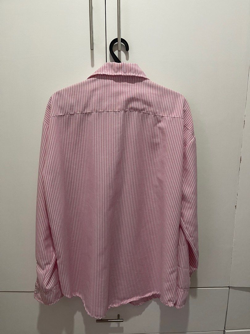 Pink Striped Oversized Long sleeve Shirt (Category: Shirts) located in Bulacan. Submitted by missjs19 (Listing ID 1400012828, Image 3). Description: Oversized polo. Height is 5’7 and this is the length on her. I’m L but this is still big on me. Only used once. NO FLAW No brand, from Greenhills. SF will be shouldered by the buyer.