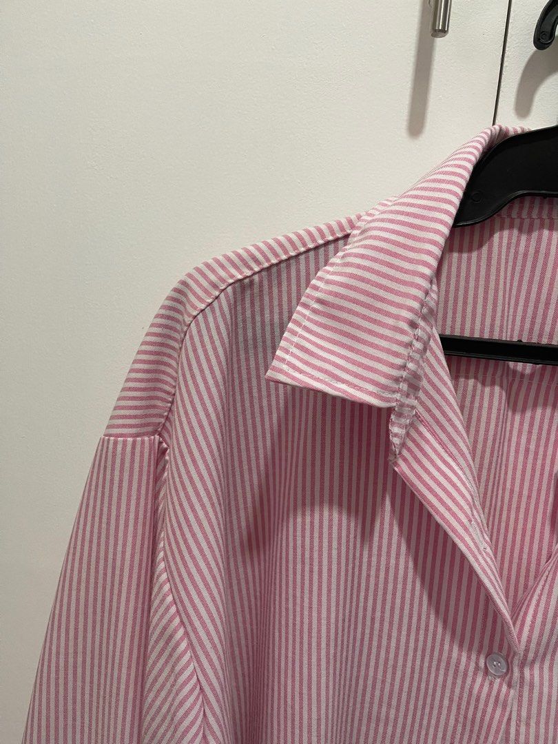 Pink Striped Oversized Long sleeve Shirt (Category: Shirts) located in Bulacan. Submitted by missjs19 (Listing ID 1400012828, Image 2). Description: Oversized polo. Height is 5’7 and this is the length on her. I’m L but this is still big on me. Only used once. NO FLAW No brand, from Greenhills. SF will be shouldered by the buyer.