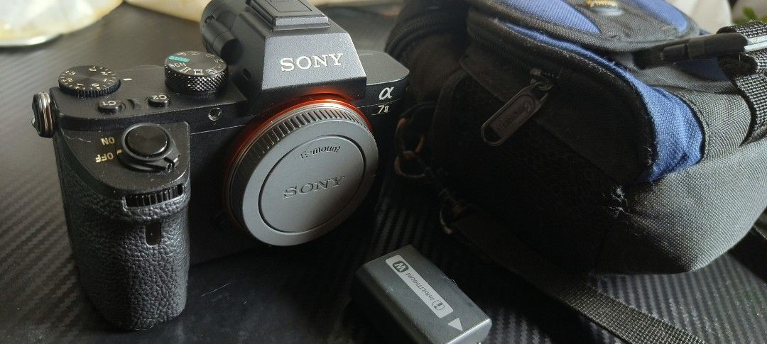 Sony A7II Camera (Category: Cameras) located in Valenzuela. Submitted by salecollectionph (Listing ID 1399868149, Image 2). Description: - Sony Alpha a7 II mirrorless camera - Includes camera body - Includes battery - Includes blue carrying case - 100% good working condition - Presentable - 18k sc only test all you want upon meet up.