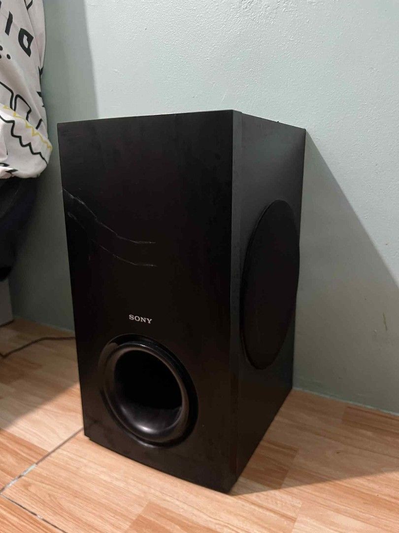 Sony Subwoofer (Category: Soundbars, Speakers & Amplifiers) located in Makati City. Submitted by sanchezmarygrace05 (Listing ID 1399932336, Image 2). Description: buy it now di na ginagamit po 1 peace only The Sony SS-WS103 is a subwoofer designed to provide deep bass for a home theater system. Its specifications include an impedance of 3 ohms and it is built to deliver accurate low-frequency responses. It is a passive unit, meaning it requires p