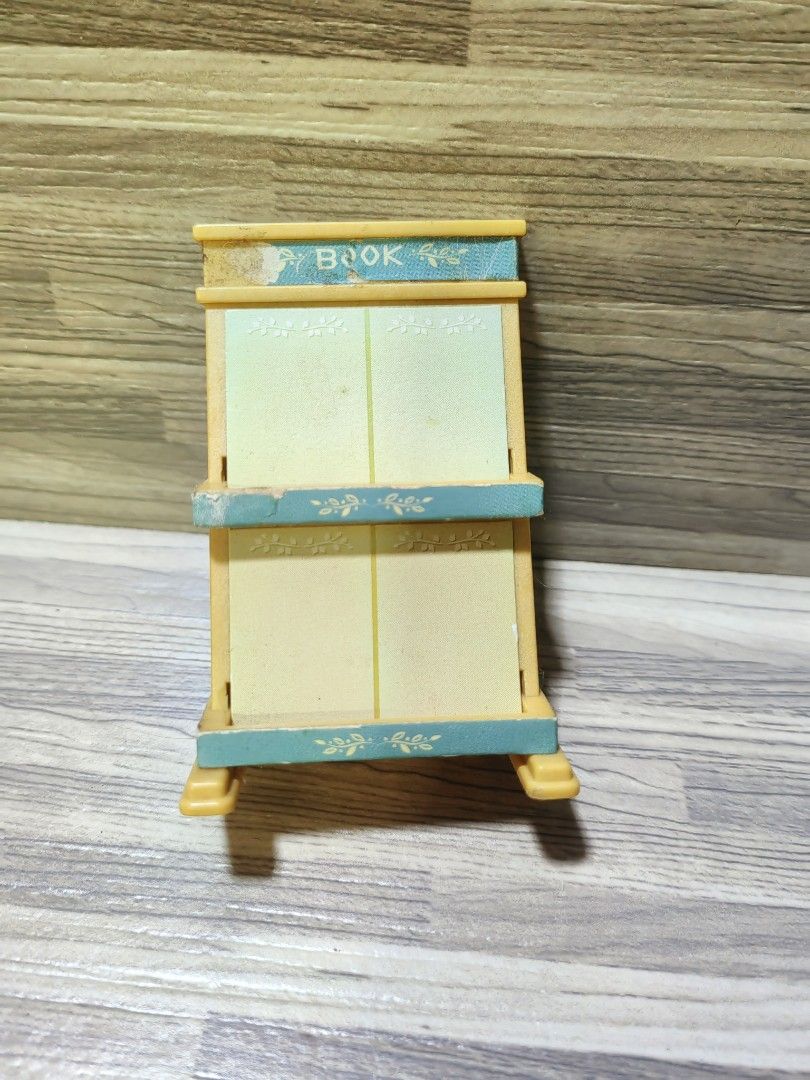Sylvanian Families book stand (Category: Designer & Blind Box Toys) located in Quezon City. Submitted by silverturtle_32df92 (Listing ID 1399979890, Image 2). Description: Original Sylvanian Families item *as is, peeling stickers *actual photos posted, what you see is what you get *no original box *DM for inquiries *Location: QC *Mode of payment: Gcash, BPI *Shipping courier: J&T, Lalamove.
