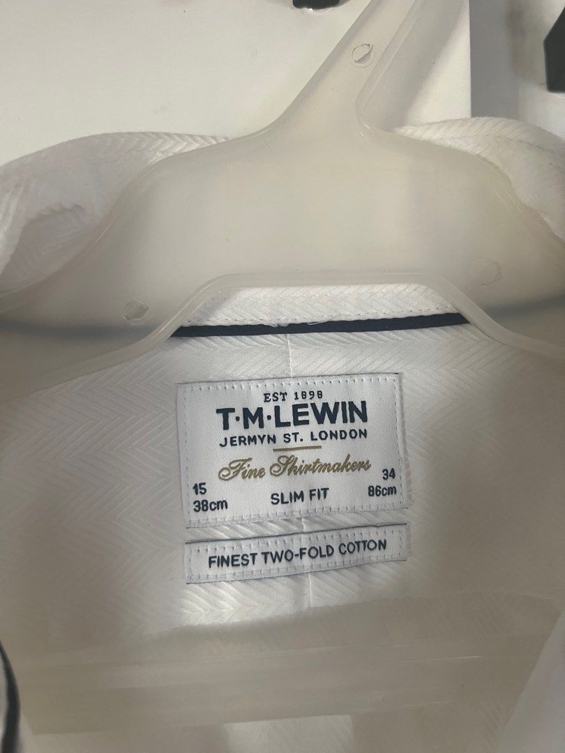 t.m.lewin White Slim Fit Shirt (Category: Tshirts & Polo Shirts ) located in Paranaque City. Submitted by atchikins (Listing ID 1399930003, Image 2). Description: Selling my dad’s T.M. Lewis white button down. rfs: decluttering mop: gcash delivery: grab/lalamove to be shouldered by buyer.