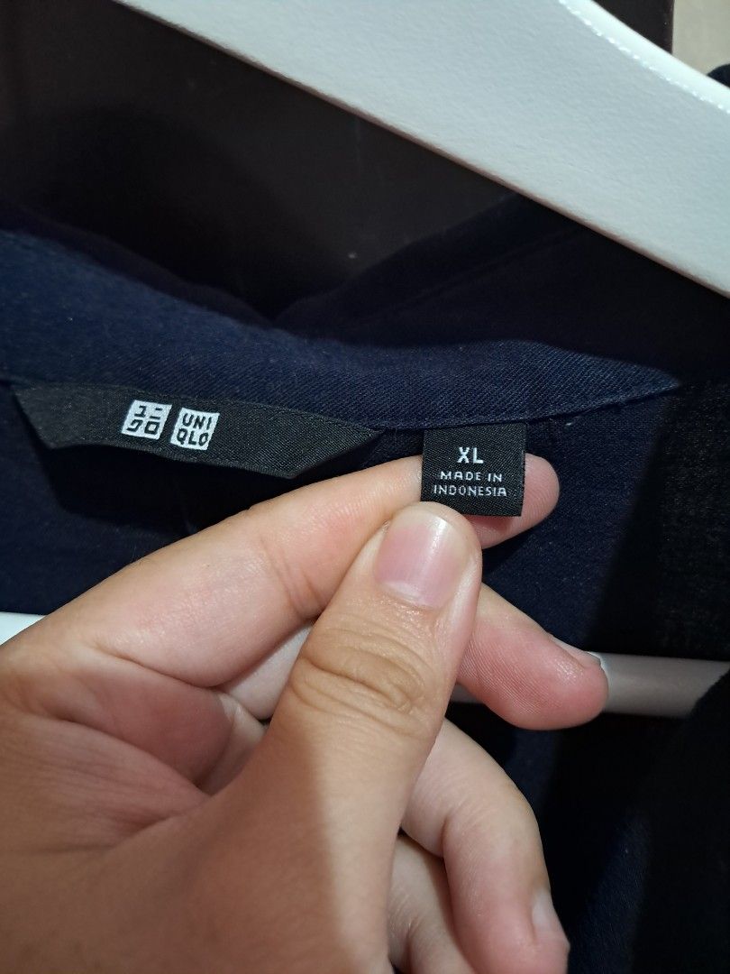 Uniqlo Women's Top (Category: Others Tops) located in General Mariano Alvarez. Submitted by thriftingi (Listing ID 1399934049, Image 3). Description: can pass as bnew. fits m-xl frames. color may vary due to lighting and camera quality..