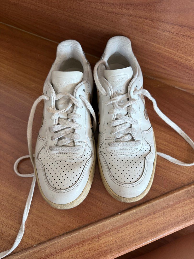 VEJA V12 Leather White Gold and Silver (Category: Sneakers) located in Taguig. Submitted by secondlifeph (Listing ID 1399873960, Image 2). Description: PRELOVED VEJA V12 Shoes With Gold and Silver labels Signs of wear Yellowing rubber but can definitely brighten it up with baking soda and hydrogen peroxide No box Bought in France in 2022 RFS: Decluttering Size: EU 35 MOP: Gcash, BDO, BPI, Metrobank PICKUP CARE OF BUYER: GOGOXpress, lalamove, Grab