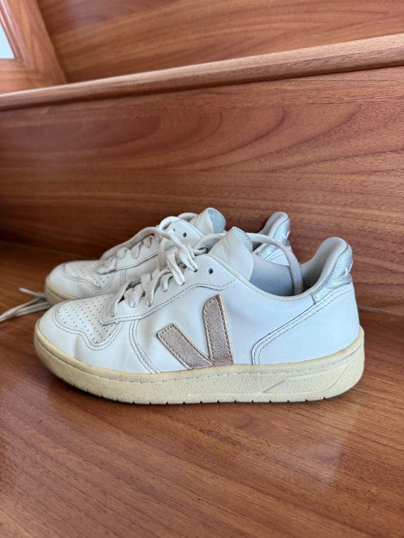 VEJA V12 Leather White Gold and Silver (Category: Sneakers) located in Taguig. Submitted by secondlifeph (Listing ID 1399873960, Image 1). Description: PRELOVED VEJA V12 Shoes With Gold and Silver labels Signs of wear Yellowing rubber but can definitely brighten it up with baking soda and hydrogen peroxide No box Bought in France in 2022 RFS: Decluttering Size: EU 35 MOP: Gcash, BDO, BPI, Metrobank PICKUP CARE OF BUYER: GOGOXpress, lalamove, Grab
