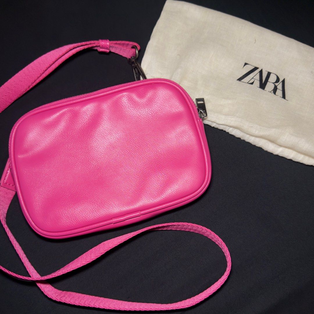 Zara Pink Crossbody Bag (Category: Cross-body Bags) located in Quezon City. Submitted by markjaredvibes (Listing ID 1399928753, Image 1). Description: Zara Pink Crossbody Bag Used only once No issues In Pristine condition .