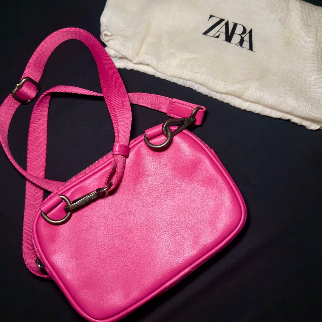 Zara Pink Crossbody Bag (Category: Cross-body Bags) located in Quezon City. Submitted by markjaredvibes (Listing ID 1399928753, Image 2). Description: Zara Pink Crossbody Bag Used only once No issues In Pristine condition .