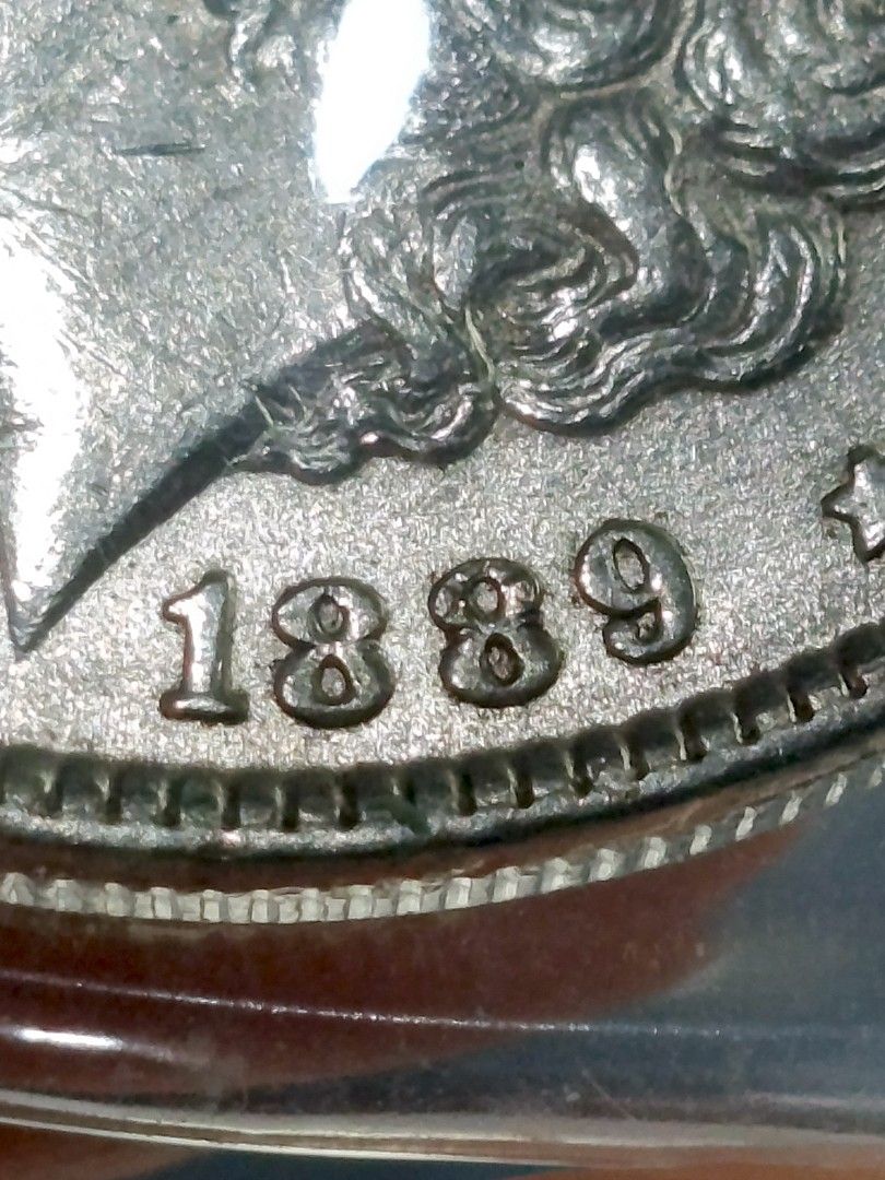 1889 Morgan Dollar W/Error & Luster (Category: Currency) located in Quezon City. Submitted by Coiners (Listing ID 1400160677, Image 3). Description: .