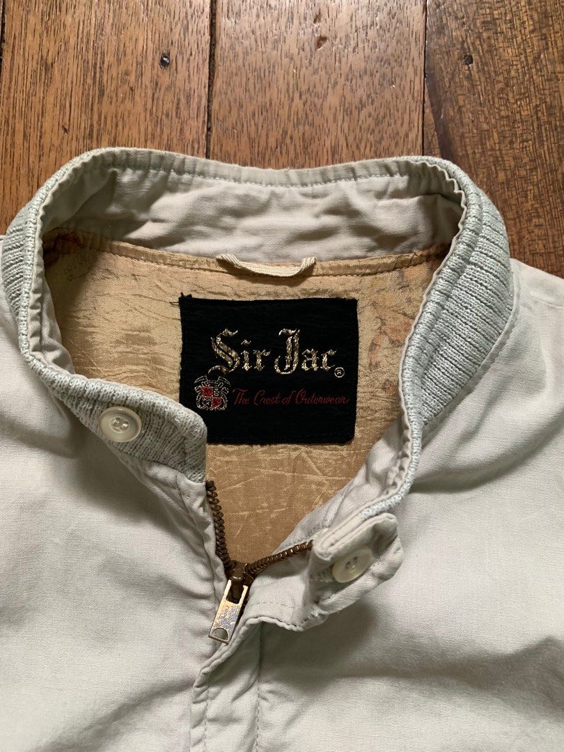 1960’s Sir Jac Cafe Racer Bomber Jacket (Category: Coats, Jackets and Outerwear) located in San Carlos. Submitted by the.almanac.ph (Listing ID 1400053675, Image 3). Description: 1960’s Sir Jac Cafe Racer Bomber Jacket Fits L Width - 23 Length - 25 Sleeve - 23 ₱ 2,000.00 +shipping fee swipe for the details and condition of the item. - Vintage Sir Jac jacket - Light beige color - Zipper closure - Collared neckline - Two front pockets - Adjustable 