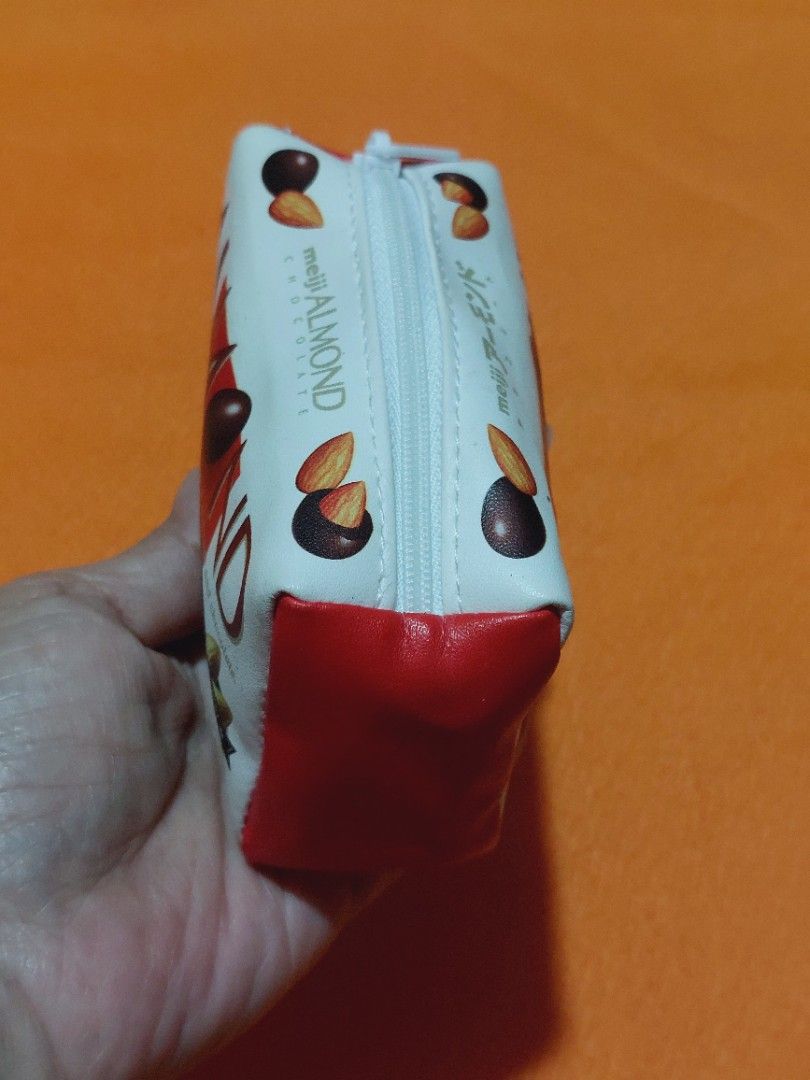 Almond Chocolate Pouch (Category: Babies & Kids Fashion) located in Muntinlupa City. Submitted by sakurambo_des (Listing ID 1400175237, Image 2). Description: Almond Chocolate Pouch/coin pouch in very good condition.