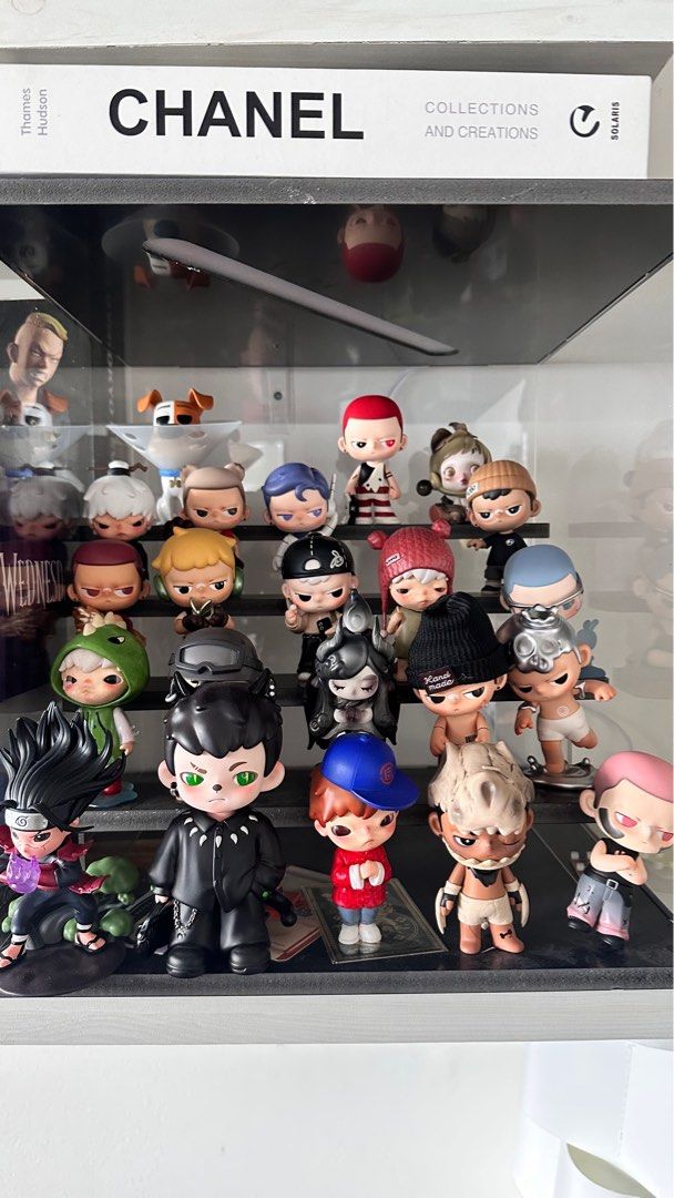Assorted Designer Toy Figures KUBO , HIRONO (Category: Designer & Blind Box Toys) located in Makati City. Submitted by patrickkkk22 (Listing ID 1400045320, Image 1). Description: All bought sa popmart sm makati kasama na yung acrylic case Quitting sale Get all for 7k nalang - Designer toy figure collection - Features various characters - Unique designs and details - Some figures with hats - Some figures in costumes - Displayed on a shelf - Includ