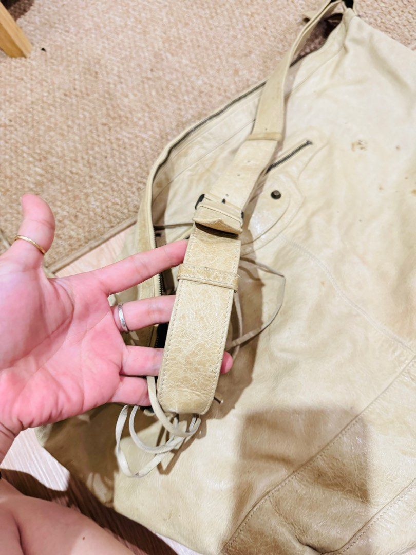 Balenciaga Leather Shoulder Bag (Category: Luxury Bags & Wallets) located in Bontoc. Submitted by bag.lover. (Listing ID 1400115228, Image 3). Description: Authentic Balenciaga Day Bag With mirror With replacement dustbag In very good used condition Flaw:some stains due to storage.