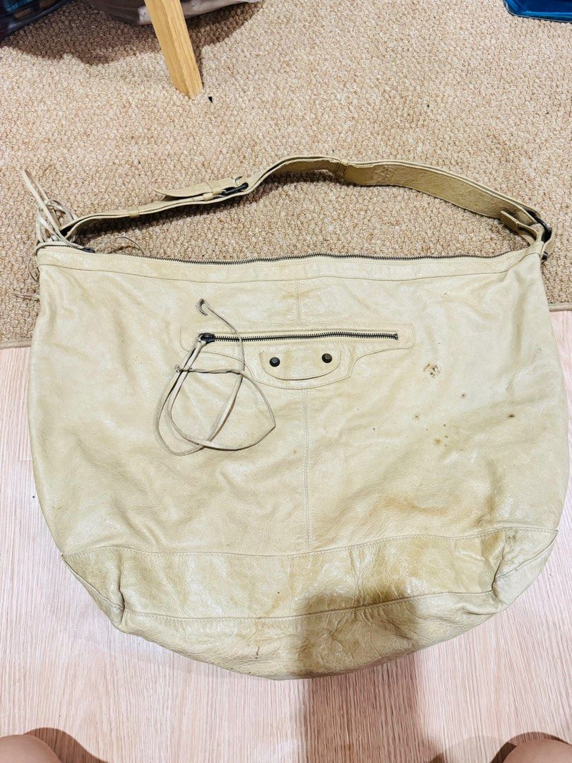 Balenciaga Leather Shoulder Bag (Category: Luxury Bags & Wallets) located in Bontoc. Submitted by bag.lover. (Listing ID 1400115228, Image 1). Description: Authentic Balenciaga Day Bag With mirror With replacement dustbag In very good used condition Flaw:some stains due to storage.