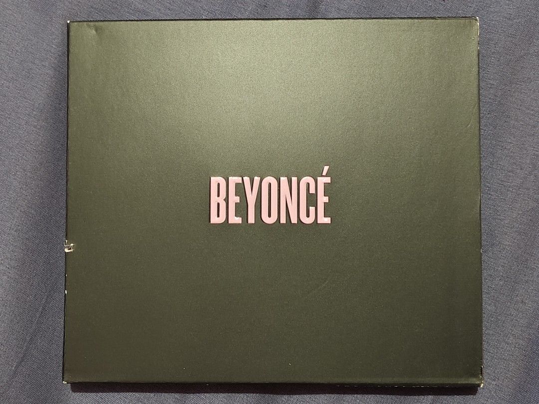 Beyonce - Beyonce Visual Album CD + DVD (EU) (Clean Version) (Category: CDs & DVDs) located in Angeles City. Submitted by the-wonder-store (Listing ID 1400013595, Image 1). Description: - Beyonce's self-titled visual album CD + DVD -Includes 14 songs and videos - Includes cardboard slipcase - The album includes tracks like "Pretty Hurts", "Drunk in Love", and "Flawless" - Pre-owned discs are in excellent condition - Clean Edited version - Slipcas