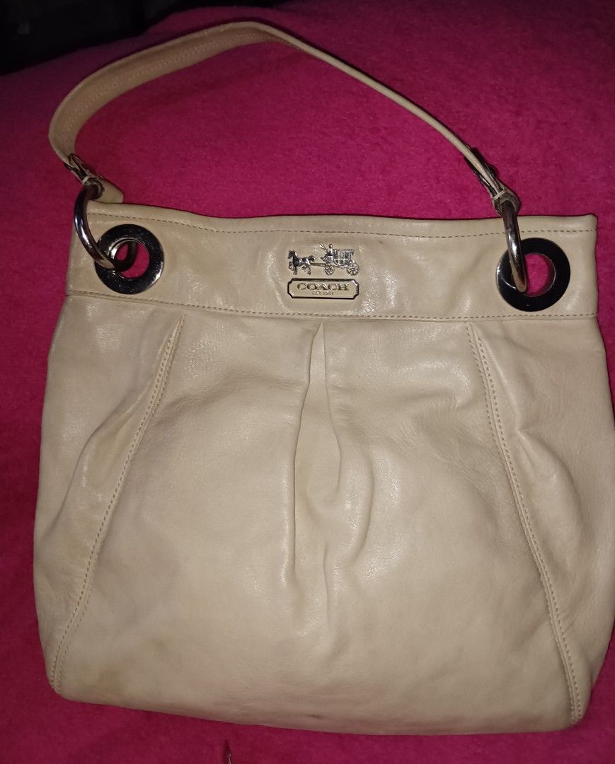 Vintage - Coach Madison Hobo (Category: Luxury Bags & Wallets) located in Pasig City. Submitted by prelovednimena (Listing ID 1400111016, Image 1). Description: Coach Madison Ivory Hobo material: leather with white buckle color: Ivory 11" x 13" with inside pockets for cellphone and another one with zipper. lining is in old rose color clean inside actual photo posted I personally own this bag. I have this in 1999. missing tag and strap RFS: too ma