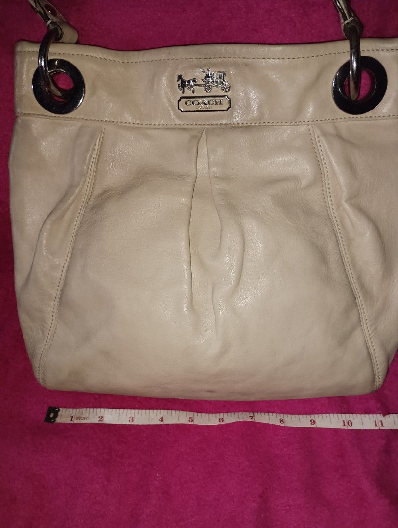 Vintage - Coach Madison Hobo (Category: Luxury Bags & Wallets) located in Pasig City. Submitted by prelovednimena (Listing ID 1400111016, Image 3). Description: Coach Madison Ivory Hobo material: leather with white buckle color: Ivory 11" x 13" with inside pockets for cellphone and another one with zipper. lining is in old rose color clean inside actual photo posted I personally own this bag. I have this in 1999. missing tag and strap RFS: too ma