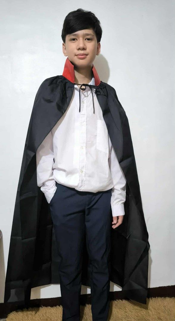 Devil Cape Costume (Category: Babies & Kids Fashion) located in Marikina City. Submitted by alecfordy (Listing ID 1400111381, Image 1). Description: - Devil costume perfect for Halloween or costume parties! - Includes a black cape with a red collar. -horn and mask 100 pesos - Features a unique black devil mask with horns. - Cape made of smooth, dark fabric. - Suitable for various events..