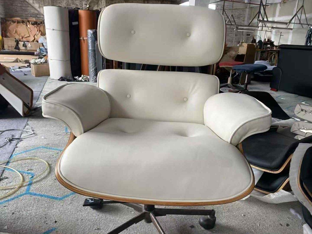 (Dupe) Eames Black Lounge Chair (Category: Chairs) located in Malabon City. Submitted by gika. (Listing ID 1400090470, Image 3). Description: Selling dupe Eames BLACK Lounge Chair, bought impulsively 🤭 Still in box but can help you assemble if needed. Only opened to check if complete materials. Real leather. Last pic for ref from shop in color white. Free delivery if within Metro Manila. Price still negotiable..