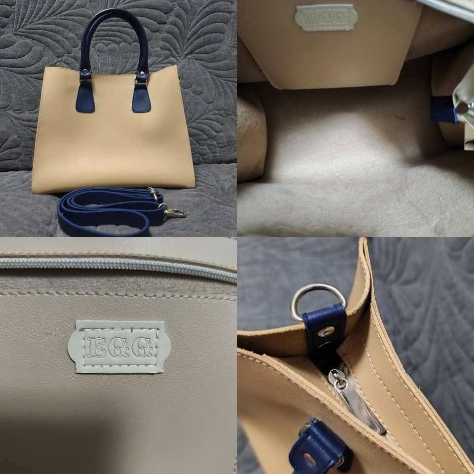 EGG handbag with sling strap (navy accents) (Category: Cross-body Bags) located in Cavite. Submitted by kookthv (Listing ID 1400101998, Image 1). Description: Brand: EGG Selling for: ₱ 250 (repriced) Bought for: ₱ 700 (mall price) condition: new and all good hardware condition. this is a handbag with sling strap. – can send other photos as well for assurance na all in good condition sya. loc: cavite mop: gcash mod: j&t.