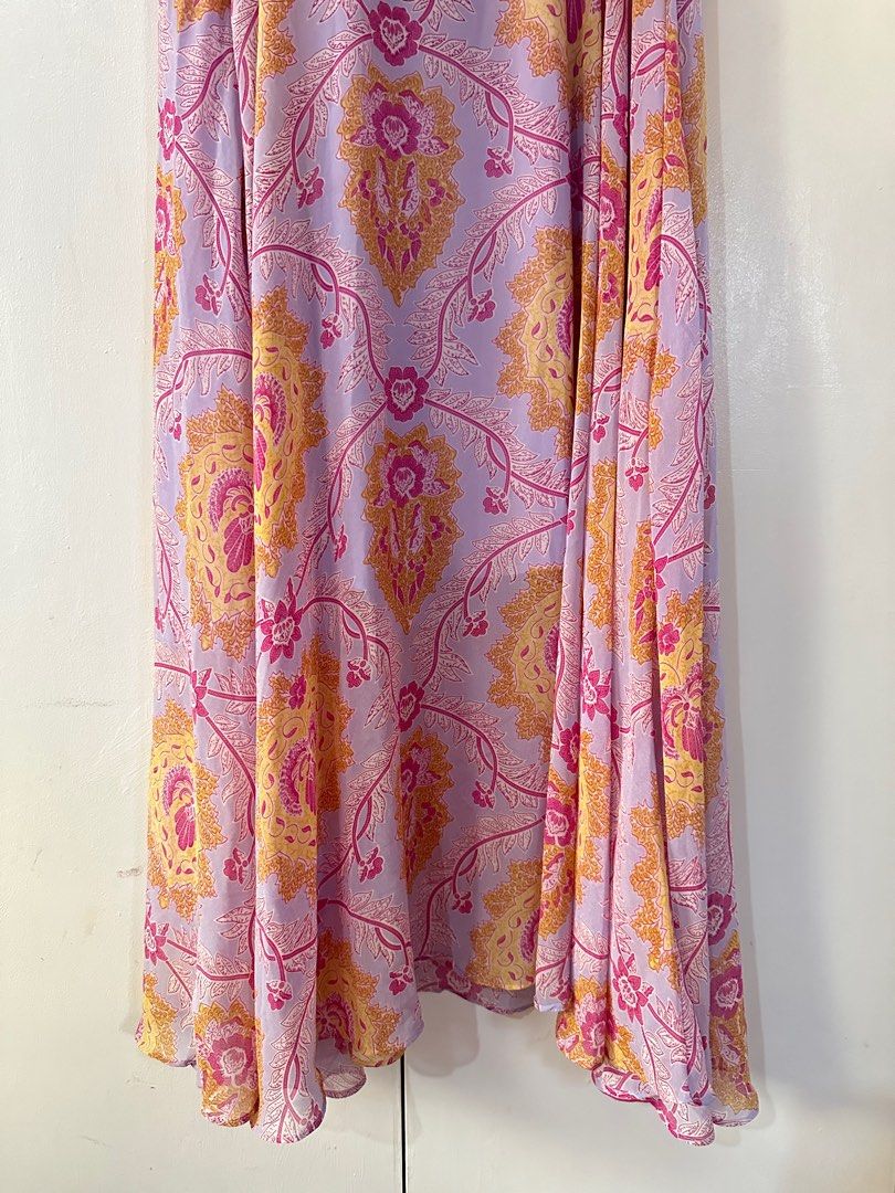 Focus Floral Wrap Dress (Category: Dresses) located in Mandaluyong City. Submitted by fizz4gudd (Listing ID 1400080128, Image 2). Description: Used Once Debut of my sister No Issue - Floral wrap dress - Colors: Purple, pink, gold - Features a V-neck - Short, ruffled sleeves - Made of lightweight, flowing fabric - Suitable for special occasions and everyday wear 📍Mandaluyong City.