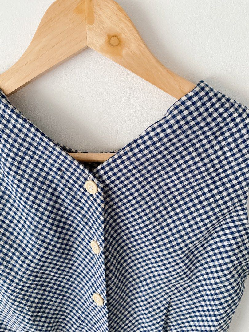 Gingham Vest (Category: Sleeveless) located in Dasmarinas. Submitted by molimoon (Listing ID 1400189435, Image 3). Description: KINDLY READ EVERYTHING. Please message me for more quiries! Item: Gingham Vest Note: - Classic navy and white gingham pattern - Button-down front closure - Made from lightweight fabric - Ideal for layering - It’s a PRE LOVED MOP: Gcash (shipping will be done upon full payment) MOD: GOGO EXPRESS.