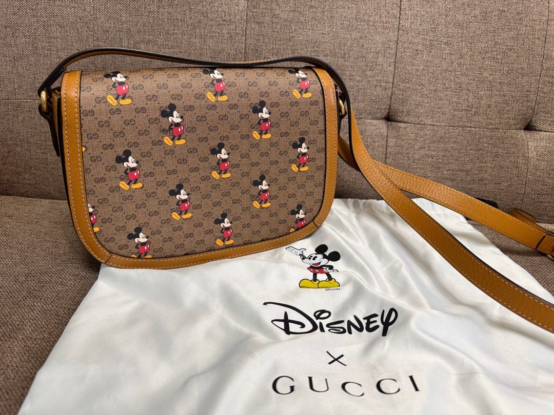 Gucci Disney Mickey Mouse Shoulder Bag (Category: Luxury Bags & Wallets) located in Taguig. Submitted by mommy_babymama (Listing ID 1400166822, Image 2). Description: Authentic Gucci x Disney GG Supreme Mickey Mouse shoulder bag in beige Original price ₱120k You can check authenticity at Shangri-La mall.