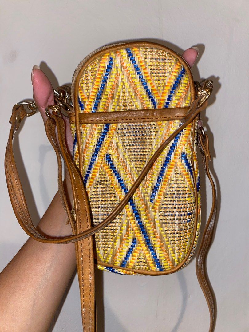 Halohalo Cellphone Bag (Category: Cross-body Bags) located in Pasig City. Submitted by raspberryfurs (Listing ID 1400161156, Image 3). Description: Beautifully handwoven cellphone bag from Halohalo, featuring vibrant yellow, blue, and orange patterns with genuine leather trim. Fits all phone sizes and small essentials perfectly — ideal for casual days or travel..