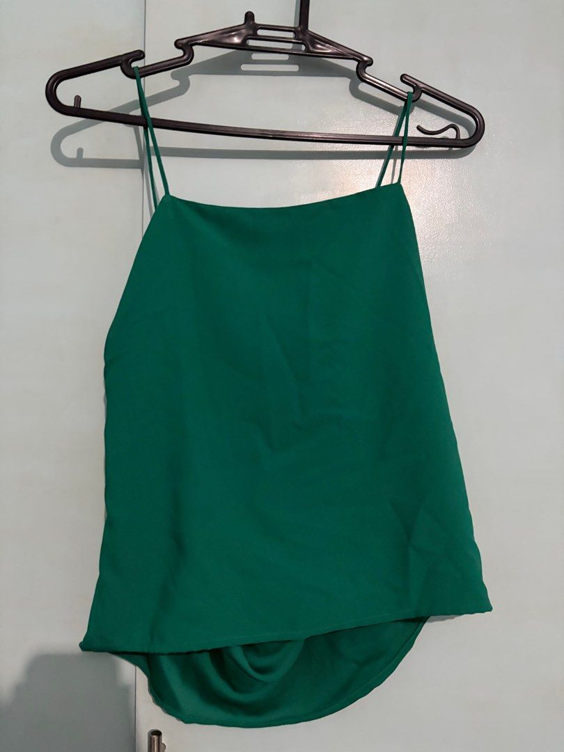 Herman & Co Green Halter with Habi Accent (Category: Sleeveless) located in Quezon City. Submitted by beeeeeeeeb (Listing ID 1400169556, Image 2). Description: - Herman & Co Green Halter top - Size: M - with a unique habi accent .