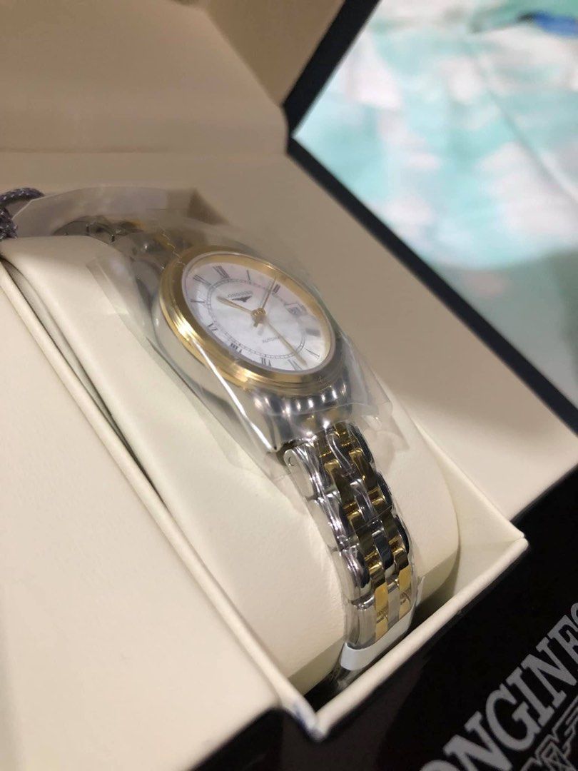 Longines Flagship 26mm Stainless Steel/PVD Automatic (Category: Luxury Watches) located in Malabon City. Submitted by immaneedspace (Listing ID 1400151372, Image 2). Description: FLAGSHIP 26MM STAINLESS STEEL/PVD AUTOMATIC (L42743217) Included * Longines Timepiece * User Manual * Watch Box * Warranty Card CASE Case Back: Transparent case back Dimension: 26.00 mm Lug Distance: 12 mm Glass: Sapphire with several layers of anti-reflective coating Ma