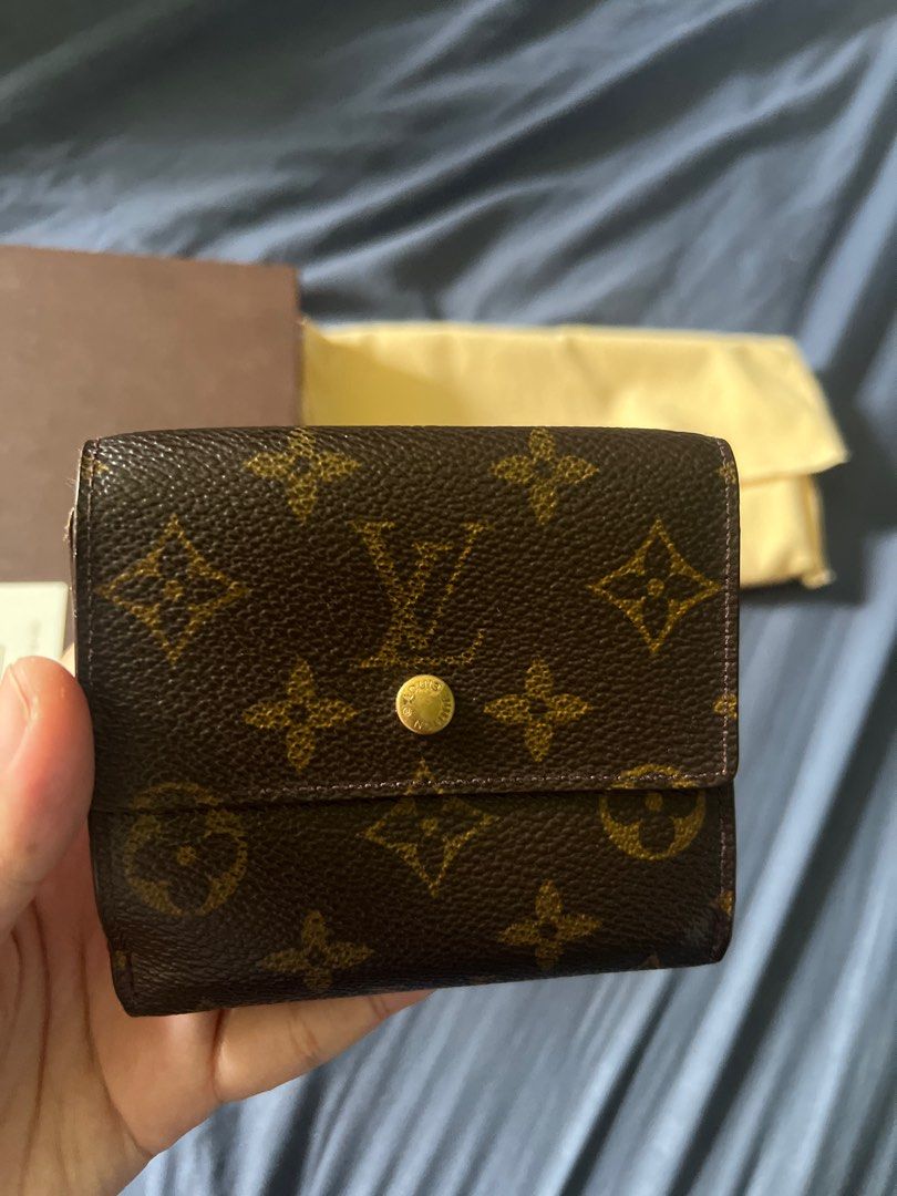 Louis Vuitton Monogram Compact Wallet (Category: Luxury Bags & Wallets) located in Quezon City. Submitted by hvamom (Listing ID 1400037755, Image 2). Description: - Authentic Louis Vuitton Monogram Compact Wallet - LV Elisse Wallet - Classic LV monogram pattern - Includes original box, dust bag, and paperwork - Multiple card slots and coin compartment - Negotiable Pls pm Rfs: need cash for my son therapy.
