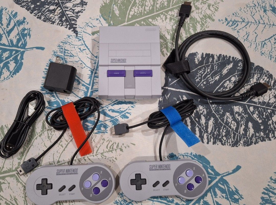 Nintendo Super Nintendo Classic Edition (Category: Nintendo) located in Zamboanga. Submitted by laserveam (Listing ID 1400034925, Image 3). Description: - Super Nintendo Classic Edition console included. - Comes with two controllers. - Includes AC adapter and HDMI cable. - Pre-loaded with classic games: Super Mario World, The Legend of Zelda: A Link to the Past, Star Fox, and more! - Includes a poster with additional game titles. The SNES Classic