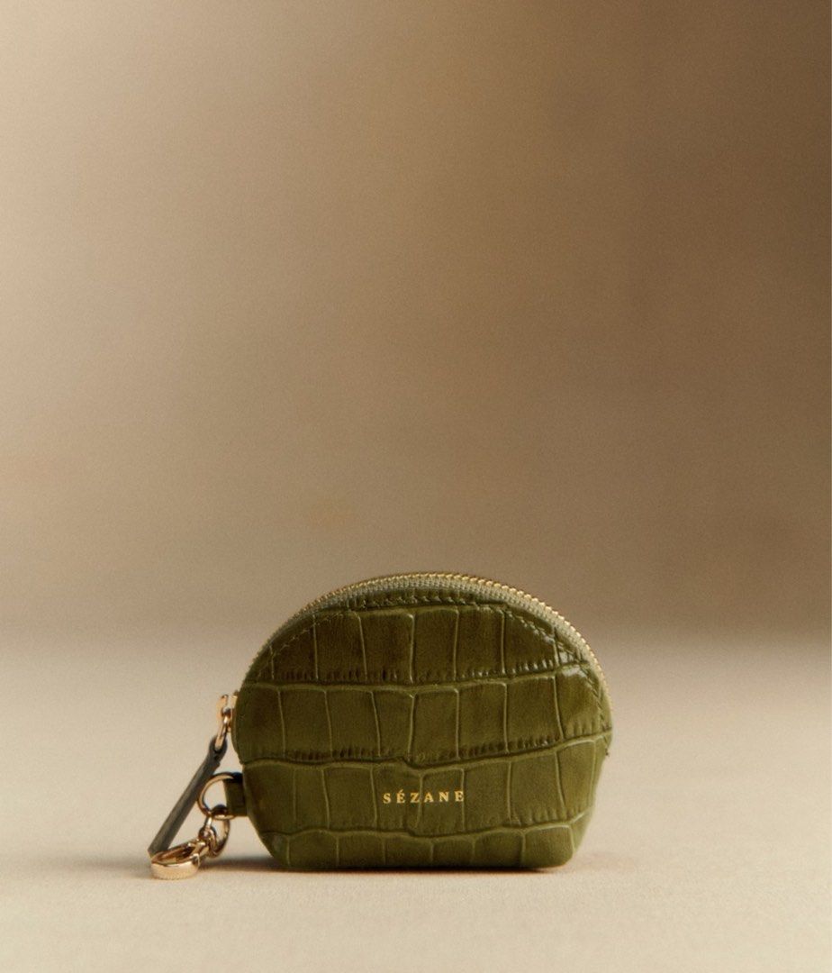 Pistachio Croc-Embossed Coin Purse (Category: Luxury Bags & Wallets) located in Las Pinas. Submitted by laladeclutters (Listing ID 1400122663, Image 1). Description: Fresh from Paris! Prettiest coin purse! 💛 You can also put your earpods here or other tiny essentials. .