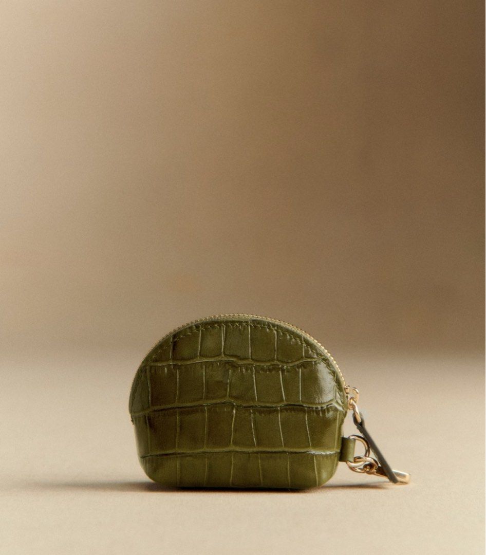 Pistachio Croc-Embossed Coin Purse (Category: Luxury Bags & Wallets) located in Las Pinas. Submitted by laladeclutters (Listing ID 1400122663, Image 2). Description: Fresh from Paris! Prettiest coin purse! 💛 You can also put your earpods here or other tiny essentials. .