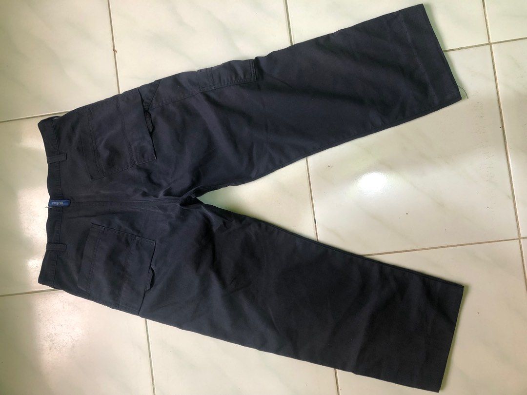 Pro Job Work Pants (Category: Joggers) located in Bien Unido. Submitted by thriftsnikulot (Listing ID 1400104653, Image 3). Description: - Pro Job work pants - Dark navy color - Multiple pockets for storage - Classic design - Belt loops and button closure - Pro Job logo visible - Made of sturdy material.