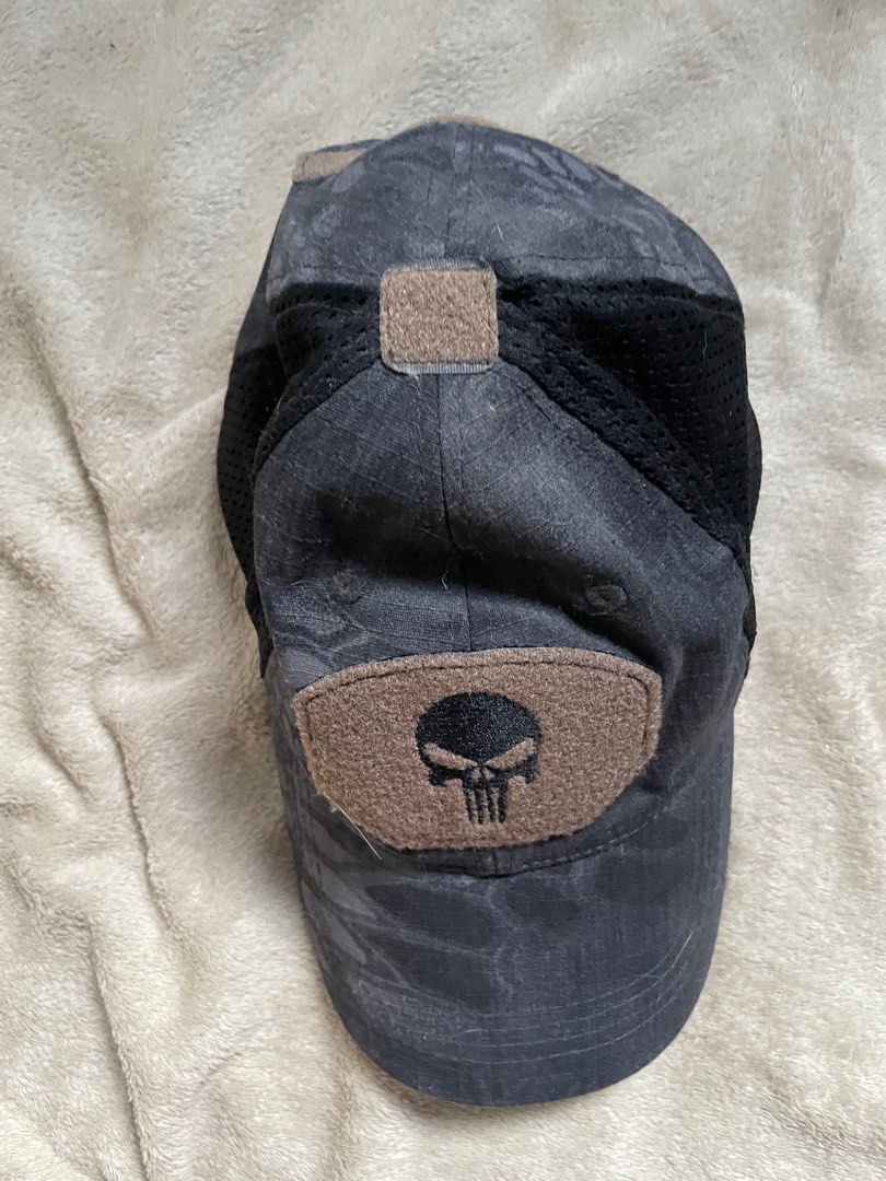 Punisher Tactical Cap (Category: Caps & Hats) located in Rizal. Submitted by declutterwsky (Listing ID 1400089796, Image 1). Description: - Tactical cap with Punisher skull patch - Mesh back - Velcro patches - Durable and functional design.