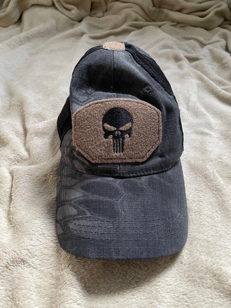 Punisher Tactical Cap (Category: Caps & Hats) located in Rizal. Submitted by declutterwsky (Listing ID 1400089796, Image 2). Description: - Tactical cap with Punisher skull patch - Mesh back - Velcro patches - Durable and functional design.