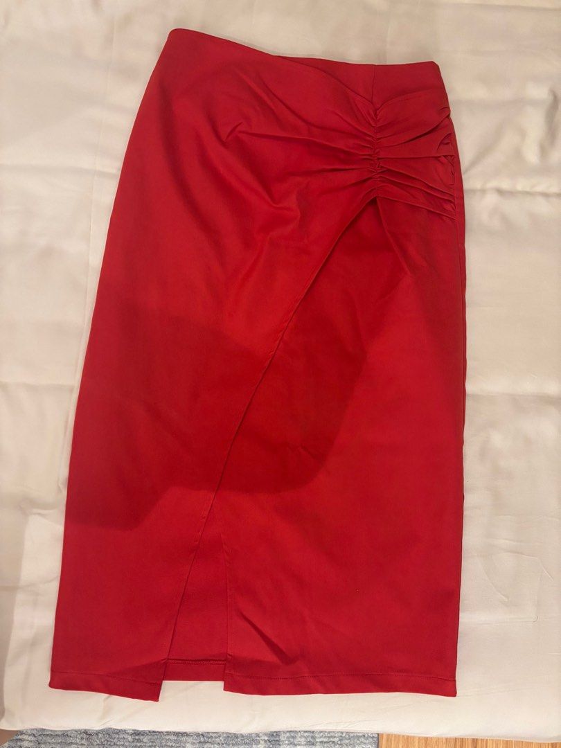 Red Rouched Midi Skirt with Slit (Category: Skirts) located in Manila. Submitted by b_fashion_closet (Listing ID 1400126050, Image 1). Description: Brand is Osmose from Singapore Color Red Size XS.