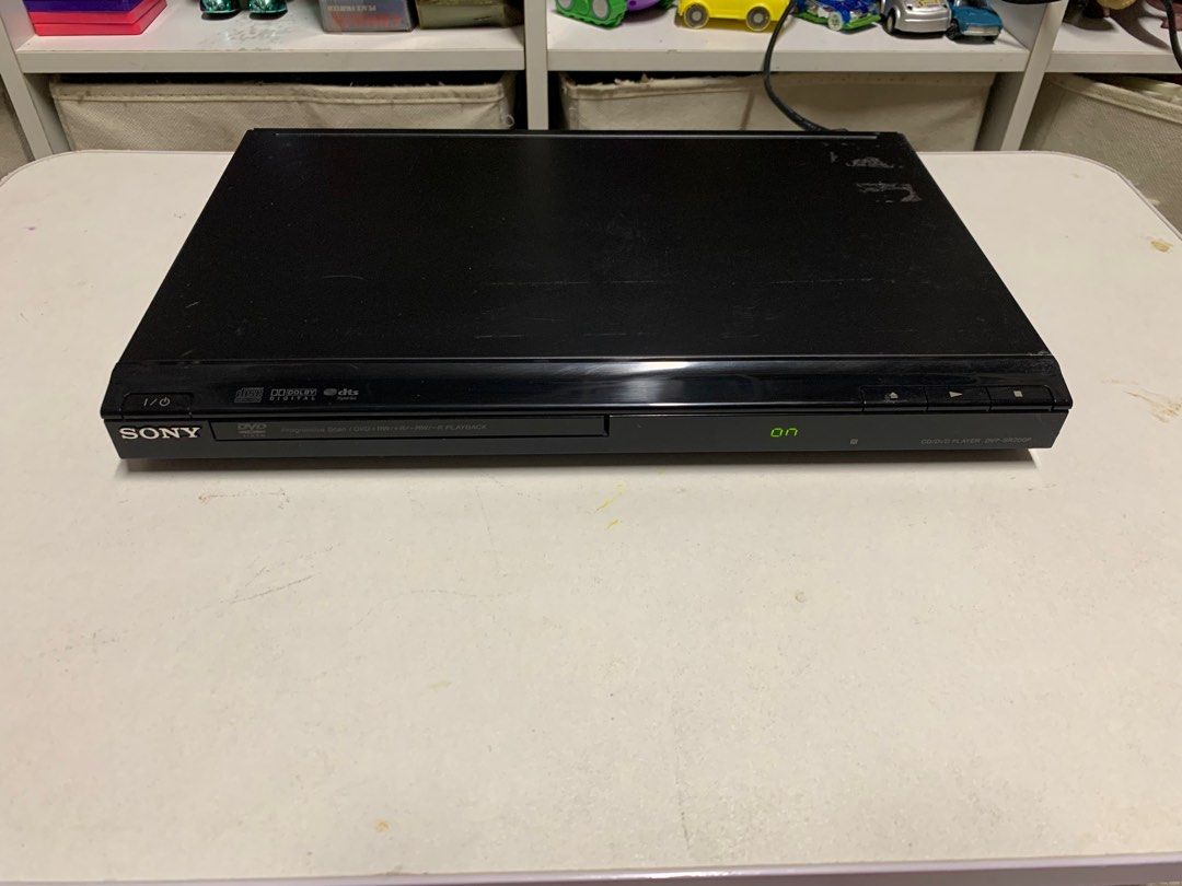 Sony DVD Video Player CD/DVD Model DVP-SR200P with Sony Remote Control (Category: Blu-Ray & Media Players) located in Paranaque City. Submitted by seb_trading (Listing ID 1400177645, Image 2). Description: Sony DVD Video Player CD/DVD Model DVP-SR200P P990 plays dvd movie, dvd video, dvdr/rw, audio cd, cd-mp3 etc. 220volt analog output only digital audio component video with Remote control last price Paranaque area.