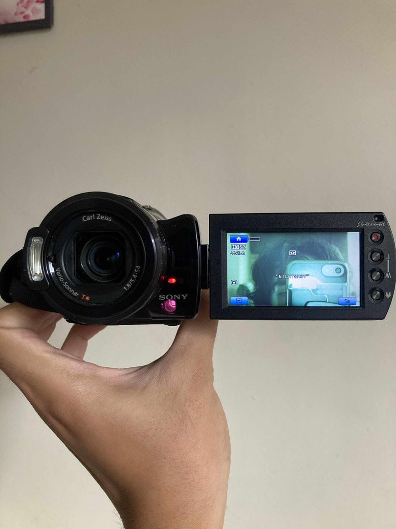 Sony Handycam HDR-SX7 (Category: Video Cameras) located in Pasig City. Submitted by findshyt (Listing ID 1400097811, Image 2). Description: Sony Handycam HDR-SX7 with night vision & flash 100% fully working tested recording & playback comes with battery, charger, memory & cable free fisheye lens ready to use ₱12,000 only free shipping.