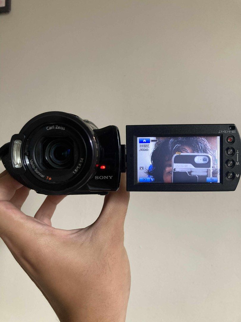 Sony Handycam HDR-SX7 (Category: Video Cameras) located in Pasig City. Submitted by findshyt (Listing ID 1400097811, Image 3). Description: Sony Handycam HDR-SX7 with night vision & flash 100% fully working tested recording & playback comes with battery, charger, memory & cable free fisheye lens ready to use ₱12,000 only free shipping.